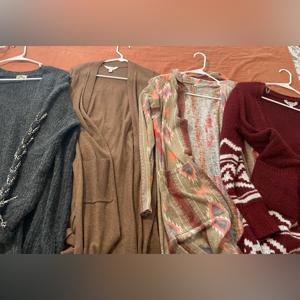 Lot of 27 cute cardigans selling for $250 makes them less than $10 each